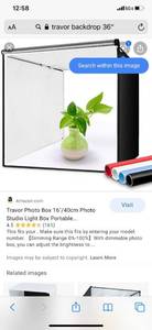 lot 4946 image: Travor 35 Inch Folding Soft Light Box Location Beside Shelf 2