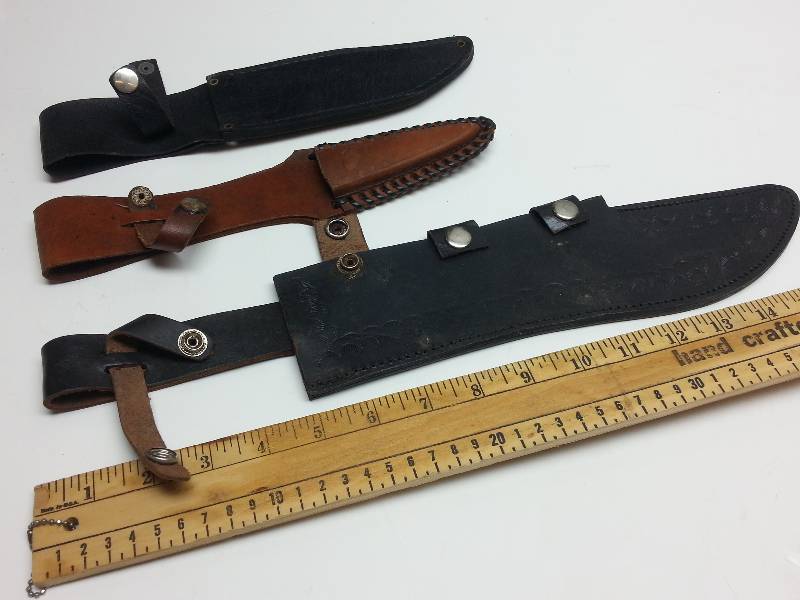 lot 1231 image: Put your Bowie knife away in one of these 3 leather sheaths