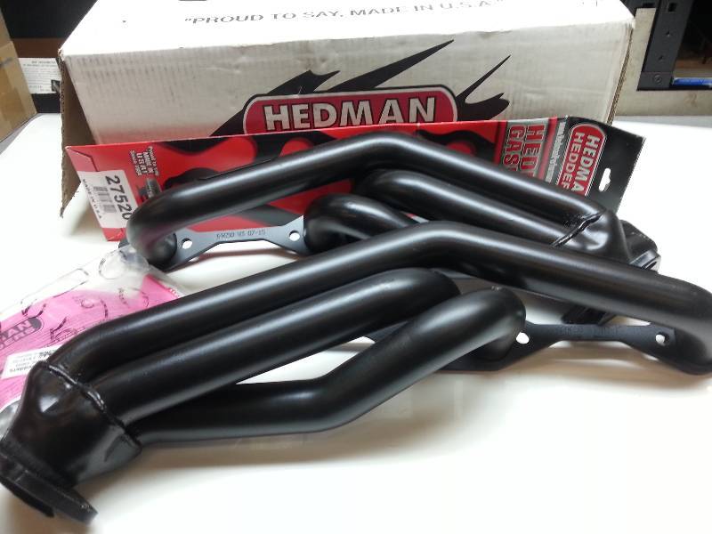 lot 1233 image: New in the box Hedman street headers part # 69650 for GMC Chevy pick up truck with SB Chevy V8