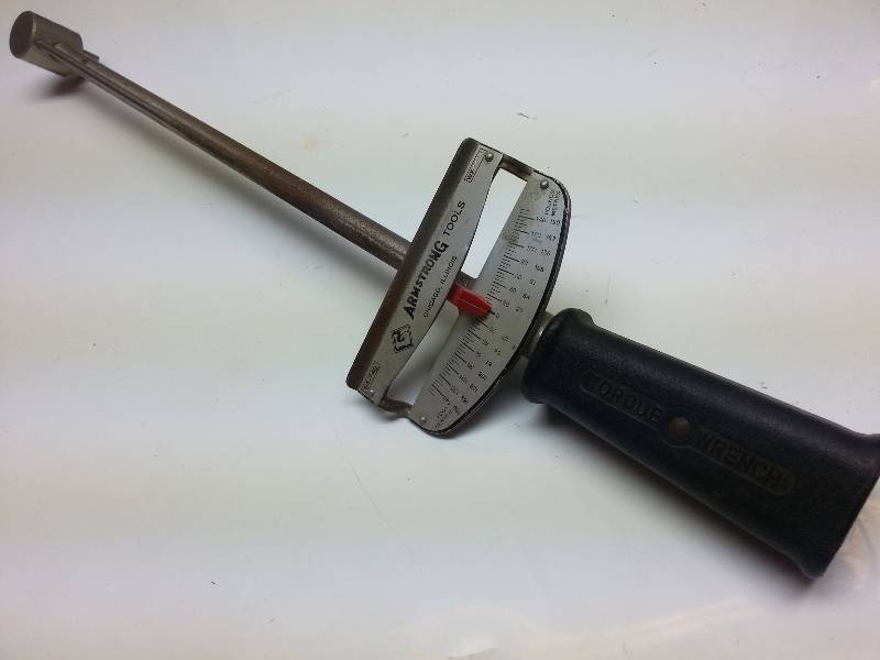 lot 1234 image: Good old fashioned hold the handle steady and torque thowe head bolts exact 12 drive