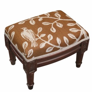 lot 95035 image: Copper Grove Castletown Caramel Upholstered Wood Footstool with Vine Accents