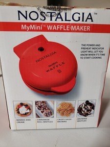 lot 95042 image: Nostalgia My Mini Waffle Maker. 5 Inch Non-stick Cooking Surface. & Sealed