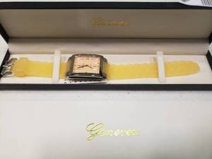 lot 1871 image: Genevex Yellow Quartz Watch