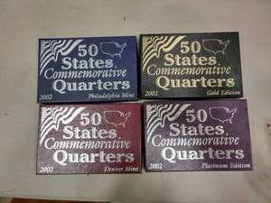 lot 1802 image: Lot of 4 Boxes of 2002 Commemorative State Quarters