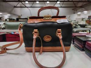 lot 2354 image: Black and Tan Dooney and Bourke Handbag