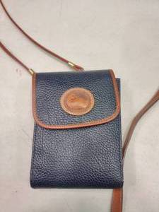 lot 2356 image: Black and Tan Dooney and Bourke Cross Body Purse