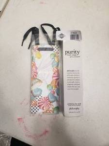 lot 2392 image: Purity Made Simple Pore Extractor with Gift Bag