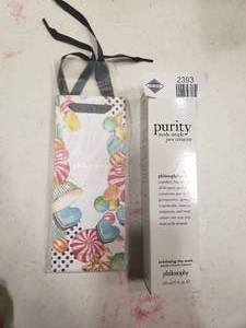 lot 2393 image: Purity Made Simple Pore Extractor with Gift Bag
