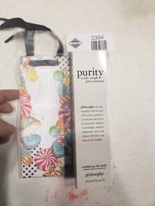lot 2394 image: Purity Made Simple Pore Extractor with Gift Bag