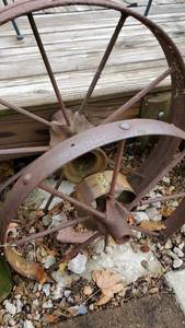 lot 3459 image: (4) Wagon Wheels In Concrete