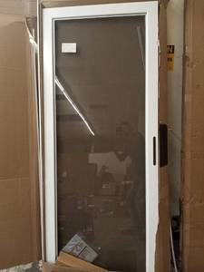 lot 38778 image: Larson Storm Door White Brushed Nickel 32x81