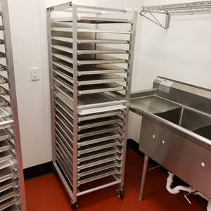 lot 9011 image: Aluminum sheet pan rack with 16 cookie sheets