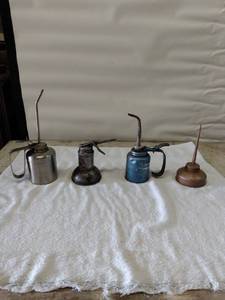 lot 5495 image: vintage oil cans