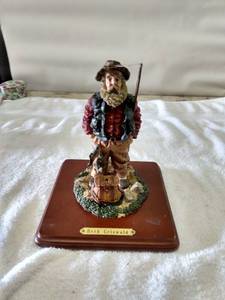 lot 5501 image: small fisherman statue