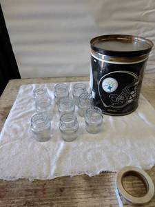 lot 5527 image: jelly jars and Steelers tin can