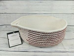 lot 62113 image: threshold storage basket with red stitching