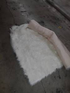 lot 65406 image: junovo Luxury Fluffy Area Rugs Furry Rug for Bedroom Faux Fur Sheepskin Nursery Rugs Fur Carpet for Kids Room Living Room Home Decor Floor Mat, 5ft x 8ft White