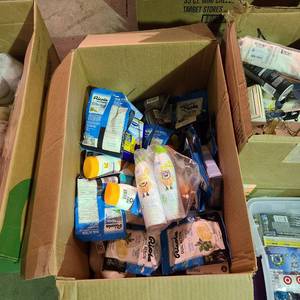 lot 55845 image: box of sun screen and ban-aids and health items as-is