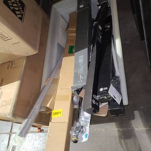 lot 55971 image: Bin of window blades and curtain rods