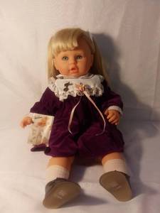 lot 5988 image: Zapf Creation Infant Doll Made in West Germany Purple Dress Easter Themed