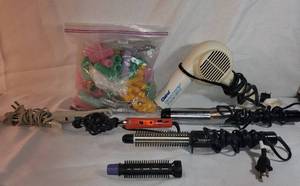 lot 9962 image: Lot of 4 Electric Curling Irons with Electric Hair Dryer. with Bag Full of Velcro Curlers