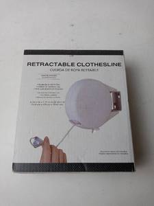 lot 271 image: Retractable Clothes Line white extends to 49 ft
