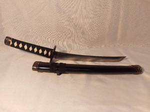 lot 1458 image: Small Stainless Steel Kanata with White Handle and Black Scabbard and Detailing Made in China