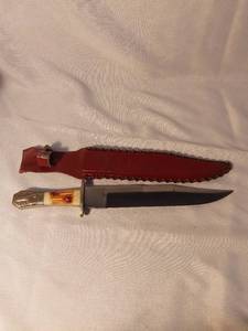 lot 1476 image: Hunting Knife with Metal and Bone Handle Blade Etched on one side with Leather Sheath