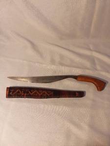 lot 1477 image: Middle Eastern Carving Curved Knife with Whicker Wood Sheath