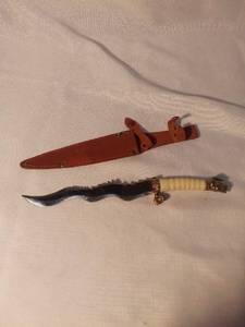 lot 1478 image: Stainless Steel Pakistani Knife with Dragon Head Pommel and Blade Shaped in Body of Dragon with Small Imperfection and Leather Sheath