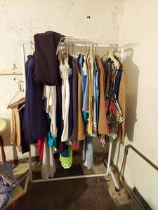 lot 6310 image: Vintage Clothing on Rack in Basement - Rack Not Included