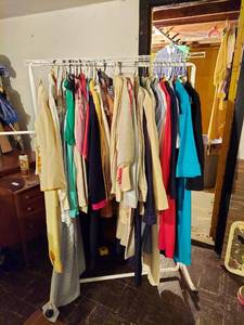 lot 6313 image: Vintage Clothes on Rack in Basement - Rack Not Included