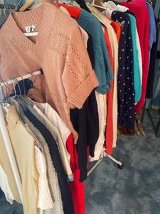lot 6124 image: all womens sweaters and clothes on rack - rack not included