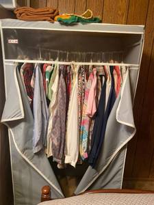 lot 6249 image: portable closet with womens clothes inside