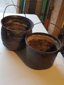 lot 6299 image: 2 cast iron flower pots