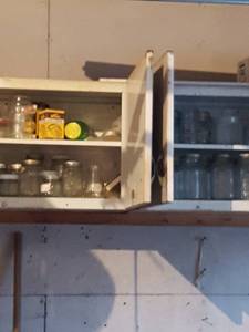 lot 6332 image: All canning jars in cabinets