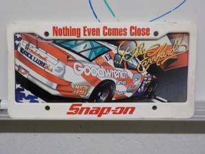lot 220 image: Dale Earnhardt License tag and Snap-On License Plate Holder