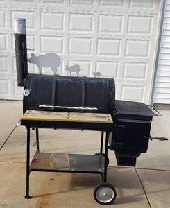lot 500 image: Custom Made BBQ Grill & Smoker from 55 Gal. Barrel  Heavy but has wheels fir mobility  60 x 40 x 69 in. tall (top of smokestack)