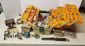 lot 522 image: Fishing Rebel Tackle Box  Full of Fishing Tackle, Lures, Filet Knife and 7 Reels