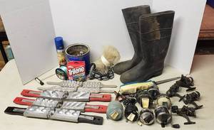 lot 524 image: Fishing Items Lead Sinker Molds, Lead Sinkers, Casting Net, Rubber Boots (size 8), Electric Filet Knife, and Reels