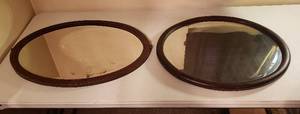lot 111 image: 2 Oval Framed Beveled Dresser Mirrors 30 x 20.5 in. & 26 x 22 in.