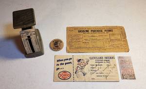 lot 133 image: Vintage Gasoline Purchase Permit (1945), Cleveland Indians Baseball Stub wpaper Holder, Vintage Postal Scale, and Wooden Nickel