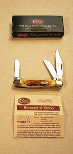 lot 145 image: CASE XX 128 LARGE STOCKMAN POCKET KNIFE JIGGED AMBER BONE 3 78 CLOSED 6347 SS wbox
