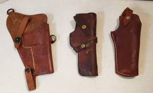 lot 179 image: 3 Leather Pistol Holsters  (1) US Embossed, (1) Brauer Bros. Mfg. Co. St. Louis H3, and (1) unmarked