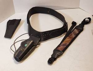 lot 180 image: Black Leather Hunter Pistol Holster wMatching Cartridge Leather Belt (size 33 to 36 in.), Assault Systems Black Nylon Pistol Holster (missing restraint) and Camo Rifle Strap