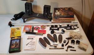 lot 193 image: Hunting & Gun Items Sight Vise, Gun Books, Cleaning Parts, Calls, Gun Parts and VHS