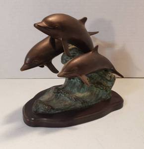 lot 213 image: Cast Brass 3 Dolphins Riding the Wave Figurine  9.5 x 6 x 9 in. tall