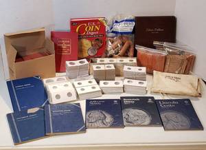 lot 219 image: Coin Collecting Items Books, Coin Holders, and PaperTubes for Rolls of Coins  no coins included