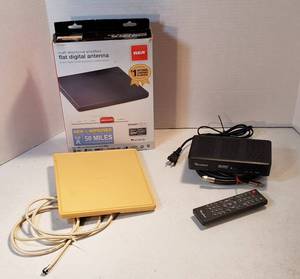 lot 222 image: 2 RCA Flat Digital Antenna ( one in box) and Homeworx Digital Transmitter w Remote