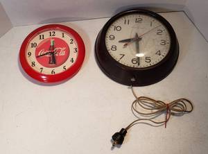 lot 225 image: 2 Wall Clocks Vintage Bakelite Shell GE electric (inside of glass needs cleaned) and Coca-Cola Battery Operated  both work